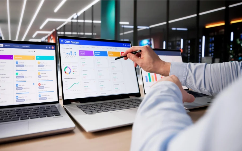 Small business owner managing clients using crm - best client management software for small business