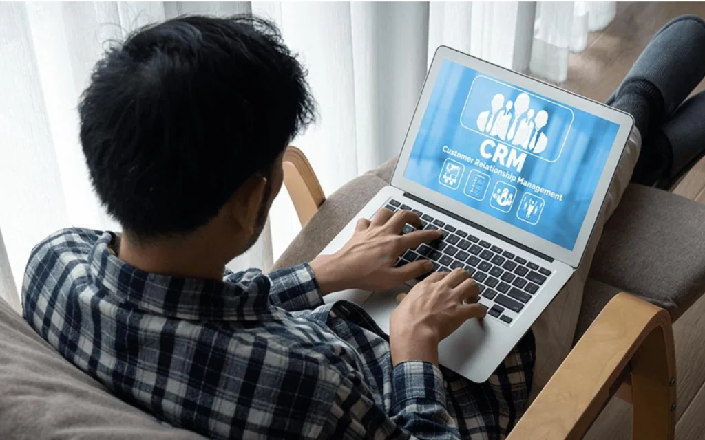 Small business using client management software to improve customer relationships