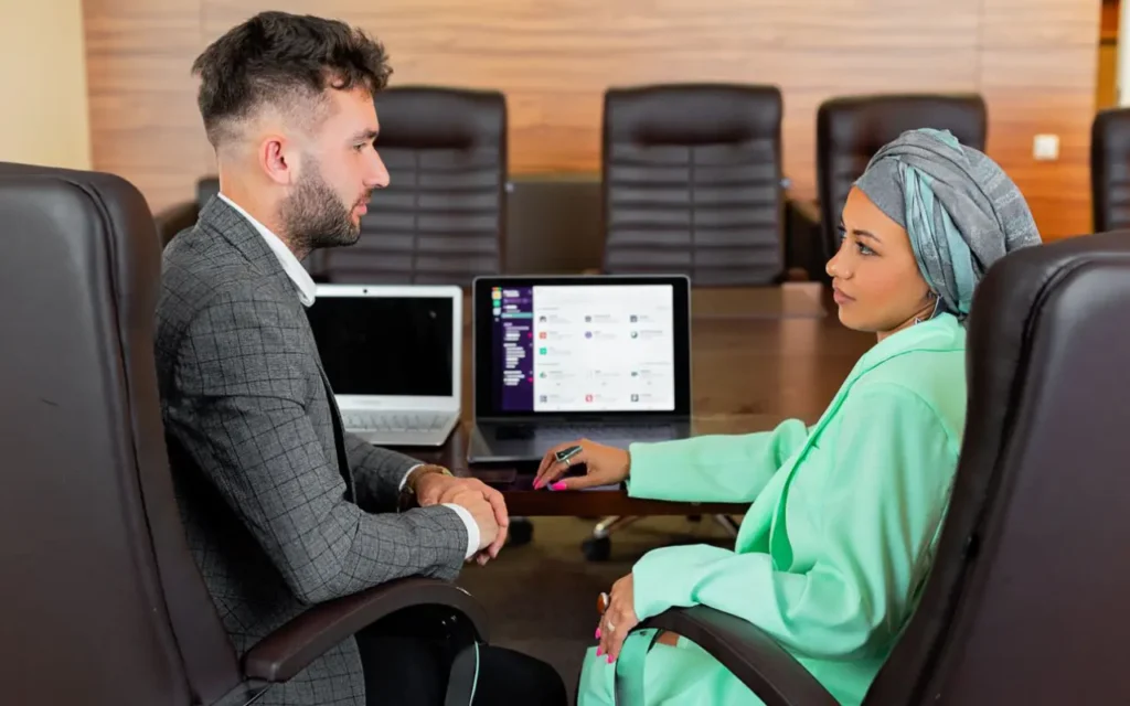 Diy client onboarding automation vs paying $120–$150 for it on upwork 14 Two professionals working together on a laptop.